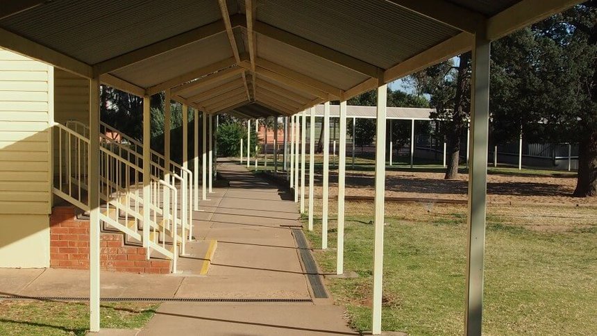 Underneath the covered walkway for Leeton school