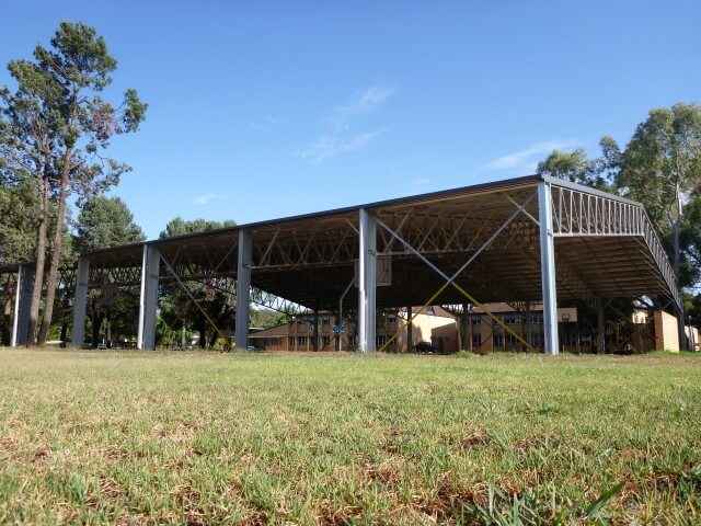 View from playground of covered outdoor basketball court